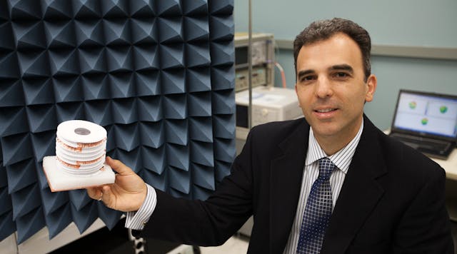 Professor Stavros Georgakopoulos with a prototype origami antenna. In regard to uses for the technology, Georgakopoulos said that it could potentially allow a soldier to carry a powerful antenna, folded into his back pocket, into combat. (Photo courtesy of FUI.)