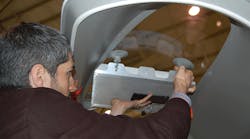 An Agile Aperture Antenna is placed in a window of an aircraft for a recent test flight. (All images courtesy of GTRI)