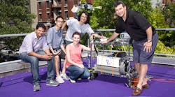 Theodore Rappaport (right) and members of NYU WIRELESS showcase some of their research. (Image courtesy of NYU)