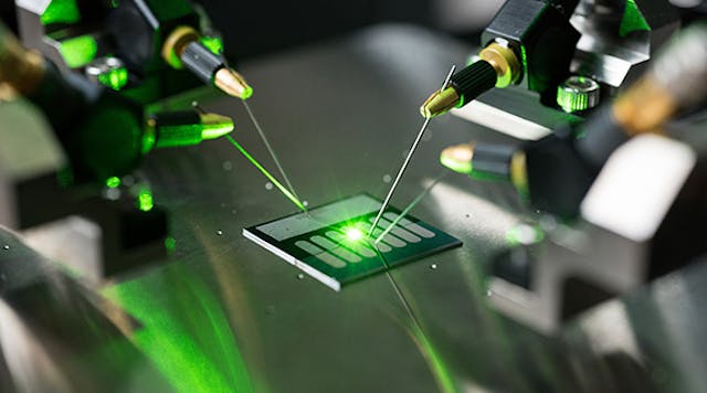 A carbon nanotube optical rectenna converts green laser light to electricity in the laboratory of Baratunde Cola at the Georgia Institute of Technology. (Image courtesy of Rob Felt, Georgia Tech).