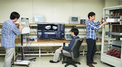 Samsung engineers, in 2013, set up tests for the chipmaker&apos;s early 5G equipment. More recent advances have produced smaller and more efficient parts for 5G wireless networks. (Image courtesy of Samsung).