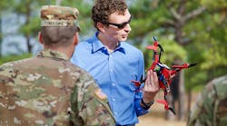 Engineer John Gerdes of the U.S. ARL explains the ODSUAS and capabilities to deliver custom tactical drones in 24 hours with 3D printing at recent demonstrations at Fort Benning, Ga. (Courtesy of U.S. ARL)