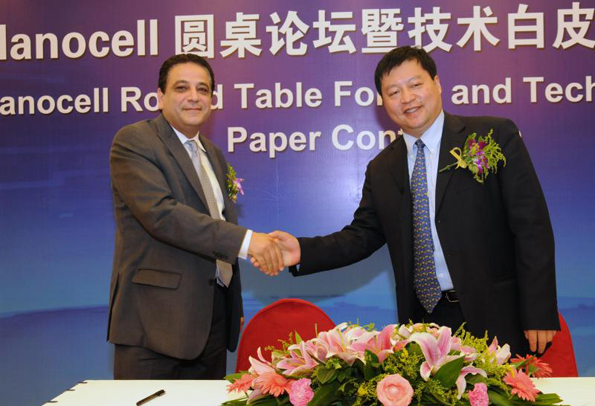 Pictured are Naser Adas Mindspeedrsquos Vice President and General Manager Wireless left and Bill Huang Director of CMCC Beijing Research right after signing the MOU at Chinarsquos Nanocell Round Table Forum