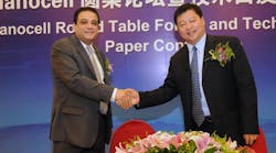 Pictured are Naser Adas, Mindspeed&rsquo;s Vice President and General Manager, Wireless (left), and Bill Huang, Director of CMCC Beijing Research (right), after signing the MOU at China&rsquo;s Nanocell Round Table Forum.