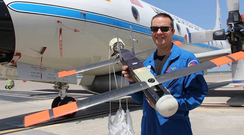 NOAA hurricane researcher Joe Cione holds a lightweight Coyote UAV, developed by Raytheon initially for battle, but now used for gathering storm data as part of weather research.