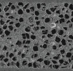 This photograph shows the microstructure of the highthermalconductivity aluminum diamond material used for heat sinks and in packages for highpower RFmicrowave devices such as GaN transistors Photo courtesy of Nano Materials International Corp This photograph shows the microstructure of the highthermalconductivity aluminum diamond material used for heat sinks and in packages for highpower RFmicrowave devices such as GaN transistors Photo courtesy of Nano Materials International Corp