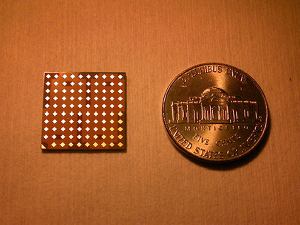 The circuit shown next to a penny for size comparison has 64 evenly spaced antennas that allow for additional chips to be aligned
