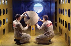 NASA technicians evaluate the temperature effects of atmospheric reentry on electronic materials Photo courtesy of NASA wwwnasagov NASA technicians evaluate the temperature effects of atmospheric reentry on electronic materials Photo courtesy of NASA wwwnasagov