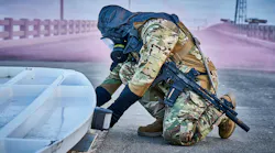 Soldier handling chemicals