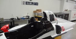 2. The cockpit and most of the IndyCar exterior portions consist of strong, lightweight graphite composites. 2. The cockpit and most of the IndyCar exterior portions consist of strong, lightweight graphite composites.