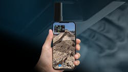2. The Pix4D scanner is attached to the back of a smartphone. The phone runs an app that controls the scanner, which can help generate a 3D map of the area observed by the back of the scanner.