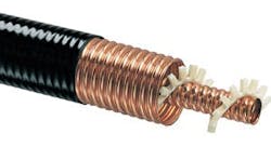 2. Cable weight and material use can be reduced with the placement of a dielectric spacer, which grips the groves in a corrugated center and outer conductor. In doing so, it maintains the coaxial nature of the cables. (Courtesy of CableWave) 2. Cable weight and material use can be reduced with the placement of a dielectric spacer, which grips the groves in a corrugated center and outer conductor. In doing so, it maintains the coaxial nature of the cables. (Courtesy of CableWave)