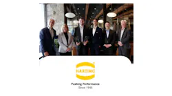 Representatives from HARTING present the Mouser team with the 2025 Global High Service Distributor of the Year Award and the Distinguished Award for New Product Sales Growth.
